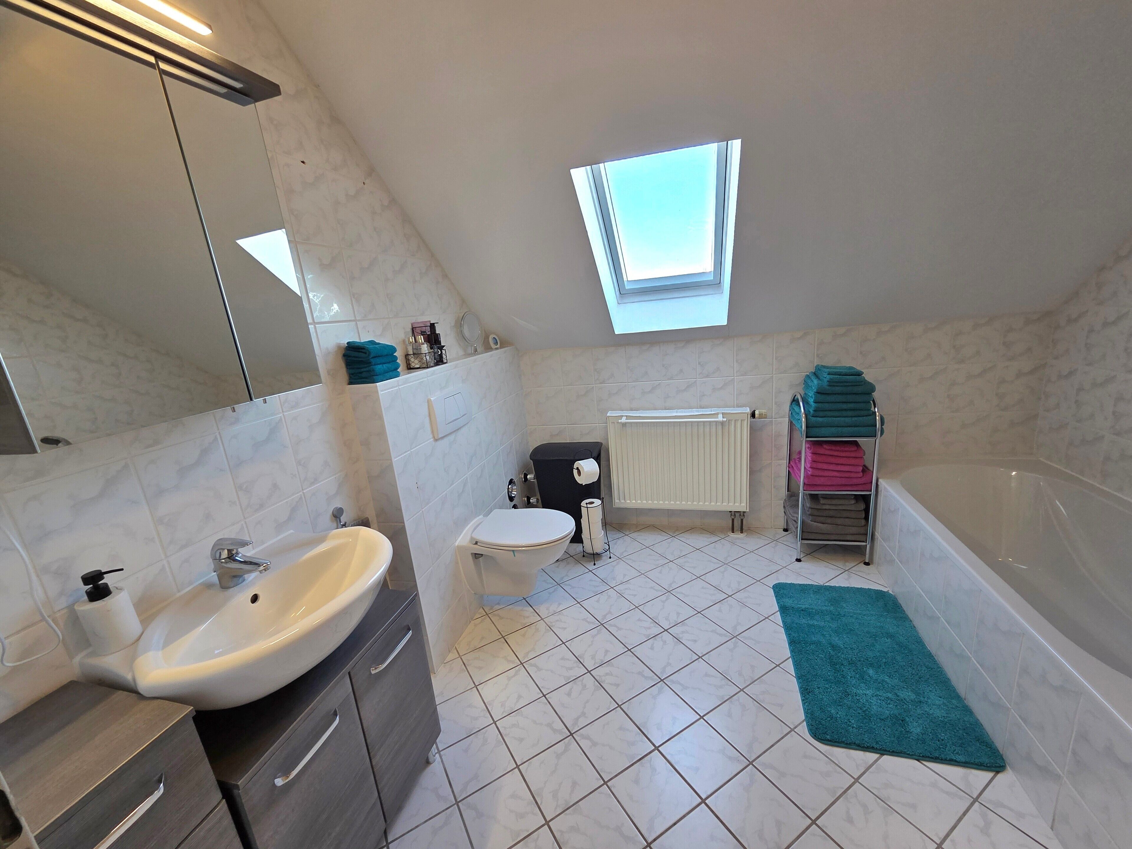 Shower, free toiletries, hair dryer, towels