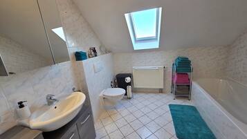 Shower, free toiletries, hair dryer, towels