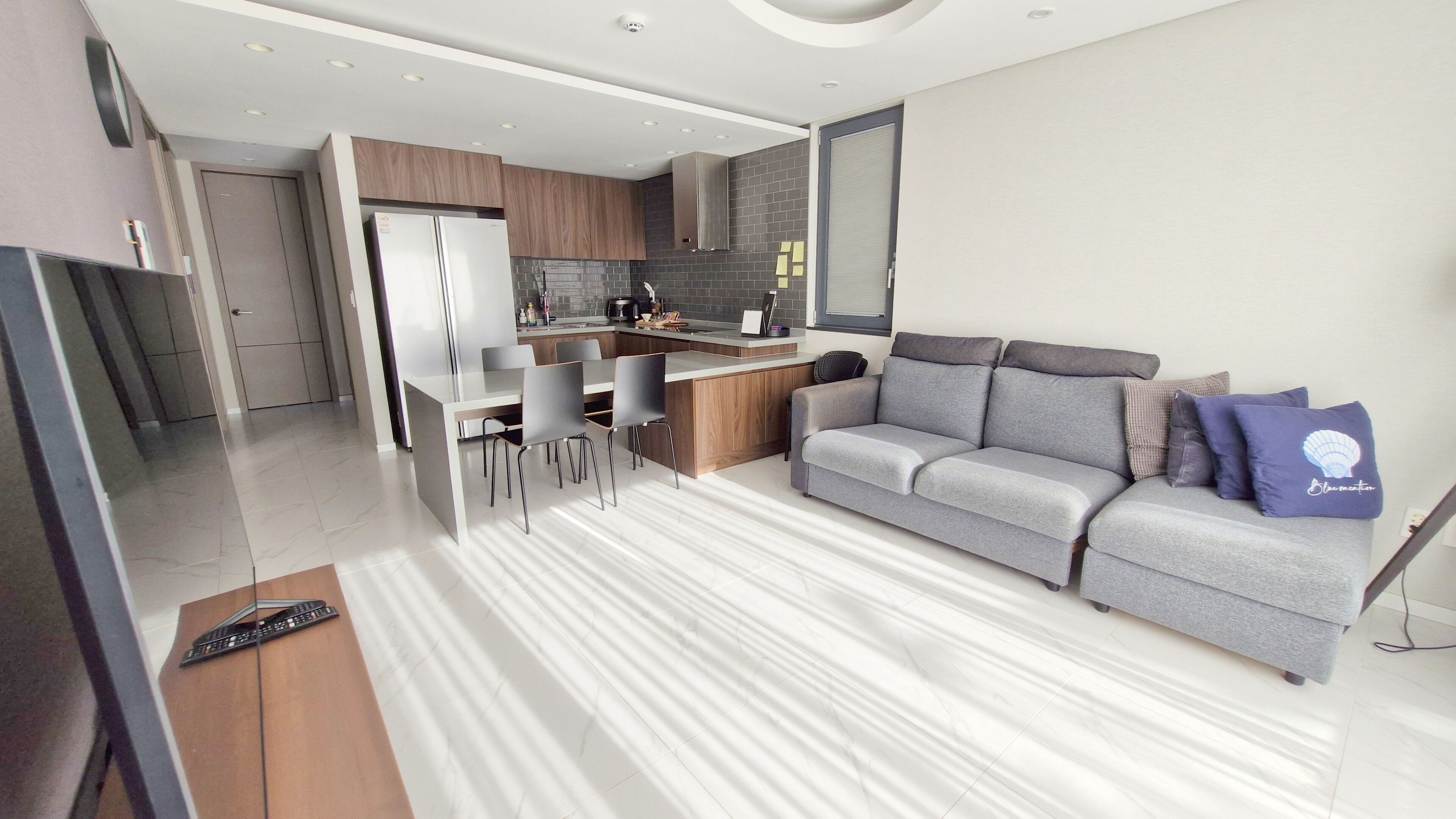 60-inch Smart TV with cable channels, Netflix, pay films