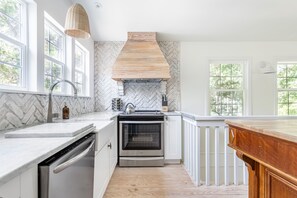 Fridge, microwave, oven, stovetop - Cast Away by AvantStay | Stunning Modern Home Near Beach w/ Two Kitchens (Isle Of Palms)