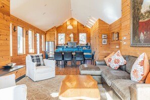 Smart TV, fireplace, books, stereo