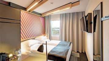 Premium tweepersoonskamer | Verduisterende gordijnen, geluiddichte muren, gratis wifi