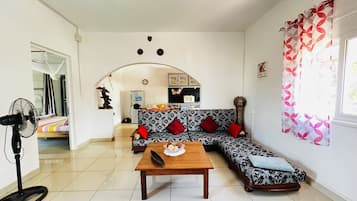Apartamento conforto | Área de estar | TV
