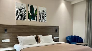 Luxury Double Room | Pillow-top beds, individually furnished, desk, laptop workspace