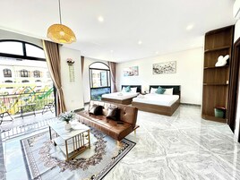 Luxury Quadruple Room, Balcony, Beach View | Minibar, desk, soundproofing, free WiFi