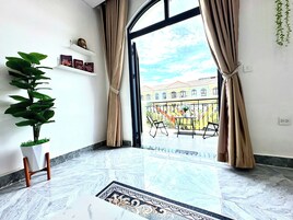 Luxury Quadruple Room, Balcony, Beach View | Minibar, desk, soundproofing, free WiFi