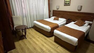Premium bedding, minibar, desk, laptop workspace