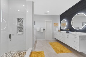 Shower, jetted tub, hair dryer, towels