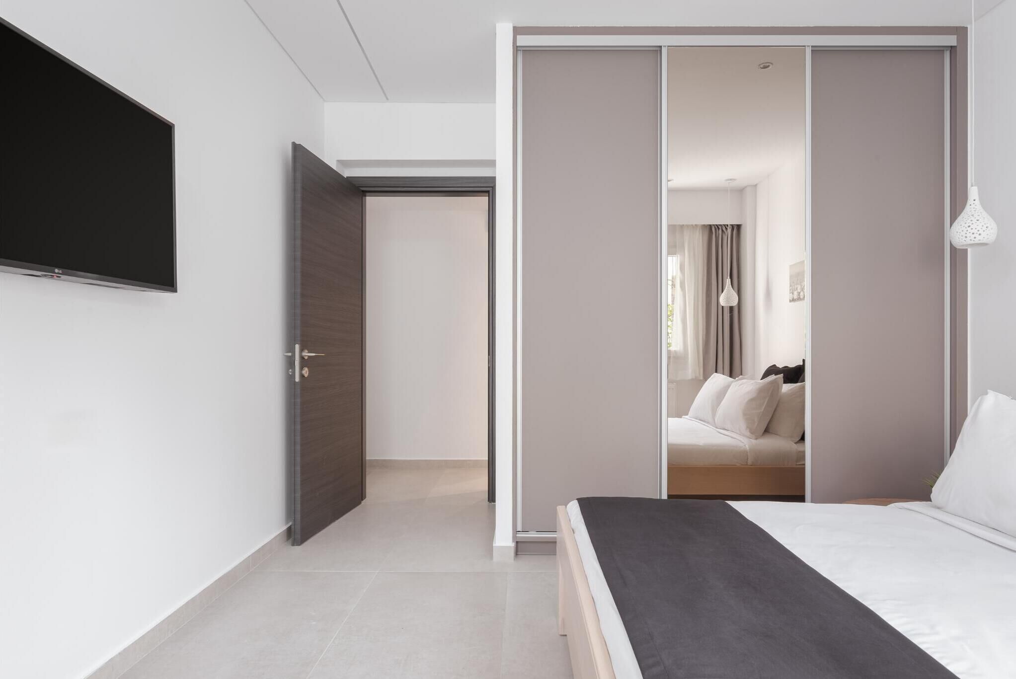 1 bedroom, desk, iron/ironing board, travel crib