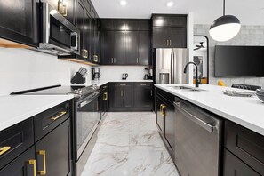 Fridge, microwave, oven, stovetop - Chloe's Chalet | Fab NEW villa next to airport - huge BRs, kitchen, pool, & more (Orlando)