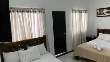 Family Quadruple Room | Down comforters, free WiFi, bed sheets