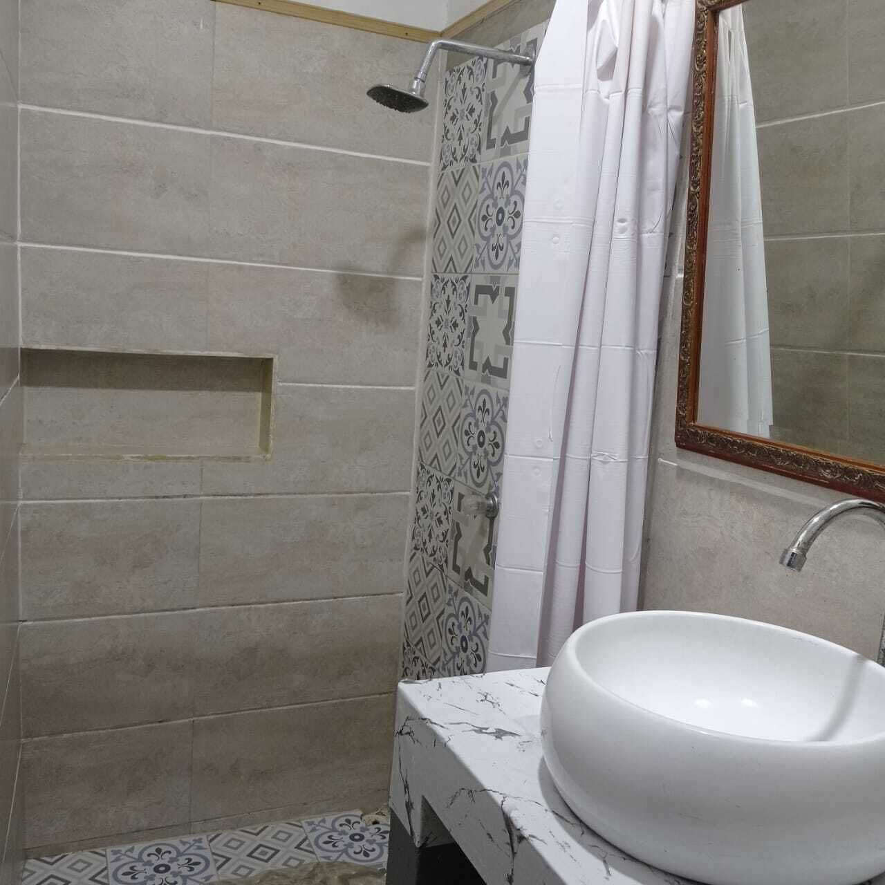 Shower, towels, soap, toilet paper