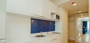 Panoramic Suite with 2 Bedrooms | Private kitchenette | Fridge, microwave, stovetop, electric kettle