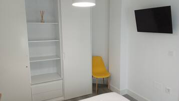 4 dormitorios, tabla de planchar con plancha, wifi gratis y ropa de cama