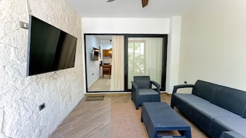 Comfort Apartment | Living area | 50-inch Smart TV with digital channels