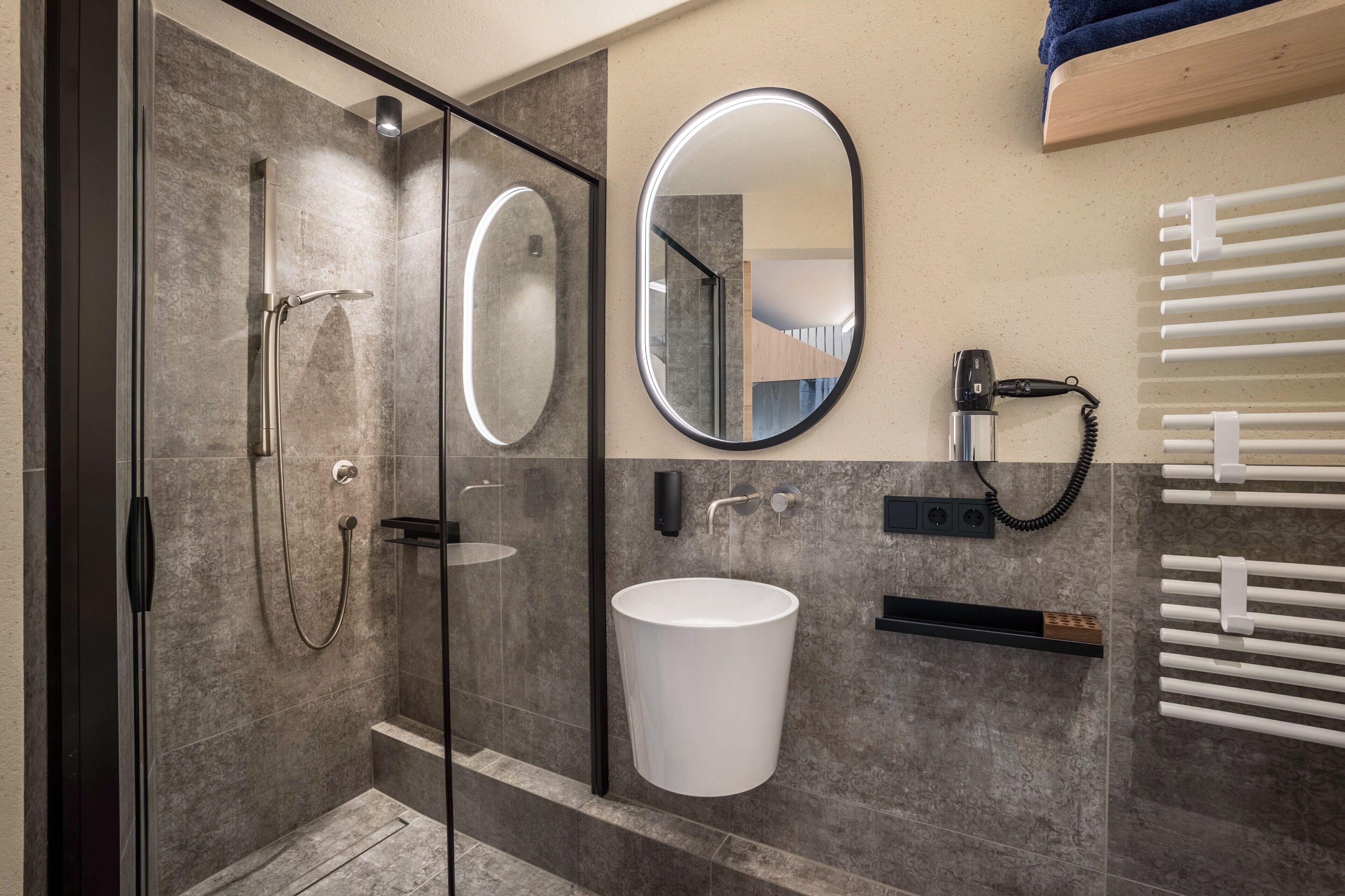 Shower, free toiletries, hair dryer, towels