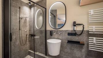 Shower, free toiletries, hair dryer, towels