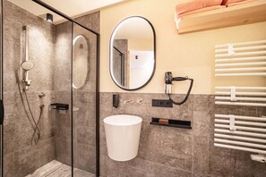 Shower, free toiletries, hair dryer, towels