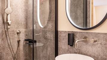 Shower, free toiletries, hair dryer, towels