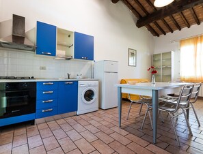 Fridge, stovetop, cookware/dishes/utensils