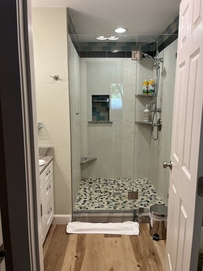 Shower, hair dryer, towels, soap