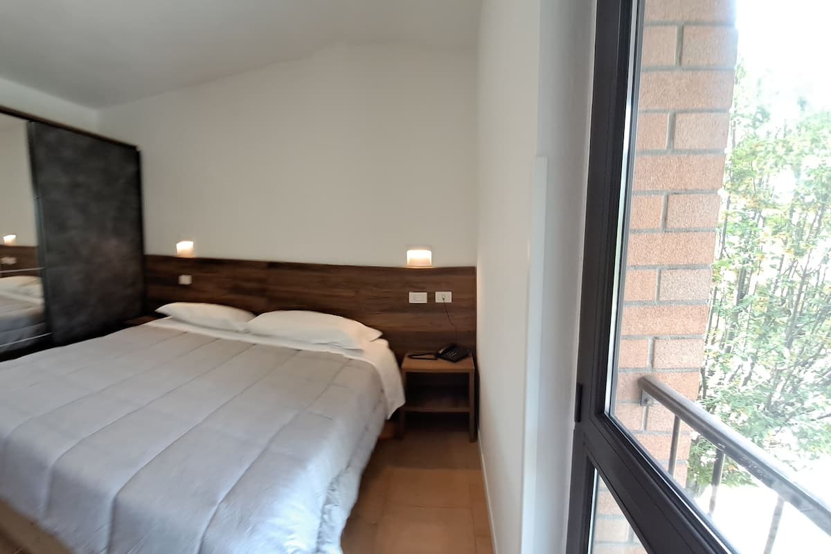 12 chambres, couette en duvet d'oie, surmatelas, minibar