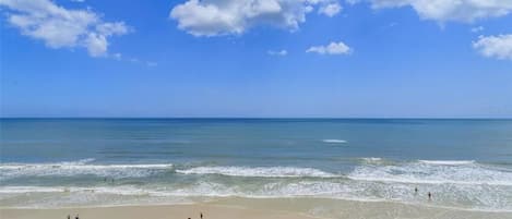 On the beach, sun-loungers, beach towels