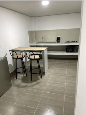 Mini-fridge, microwave, espresso maker, griddle