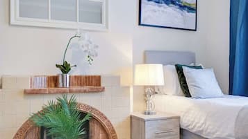 4 bedrooms, iron/ironing board, travel cot, WiFi