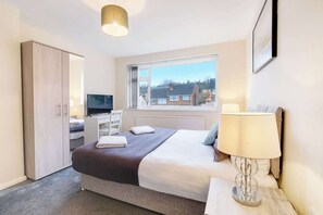 4 bedrooms, iron/ironing board, travel cot, WiFi