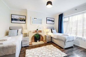 4 bedrooms, iron/ironing board, travel cot, WiFi