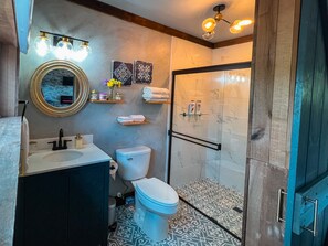 Eco-friendly toiletries, hair dryer, towels, soap