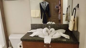 Hair dryer, towels, soap, shampoo
