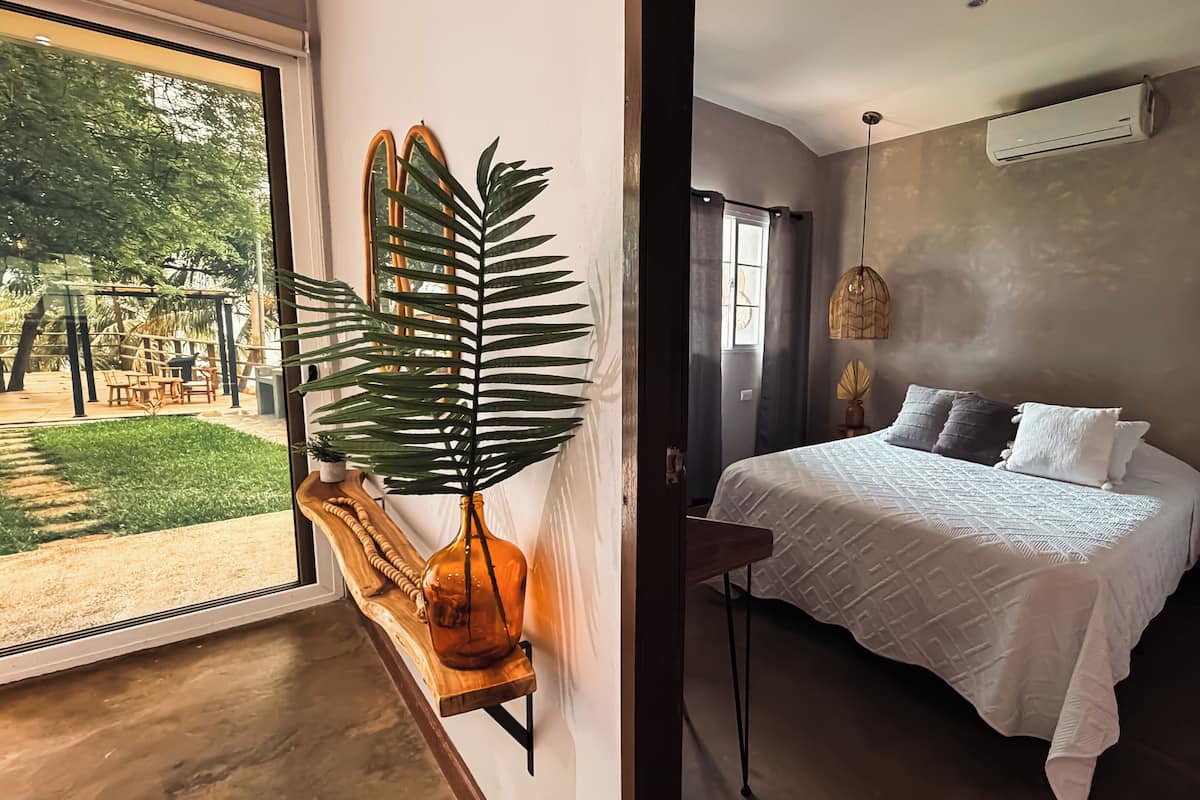 Deluxe Apartment, 2 Bedrooms, Ocean View | Down comforters, iron/ironing board (on request), cribs (free)