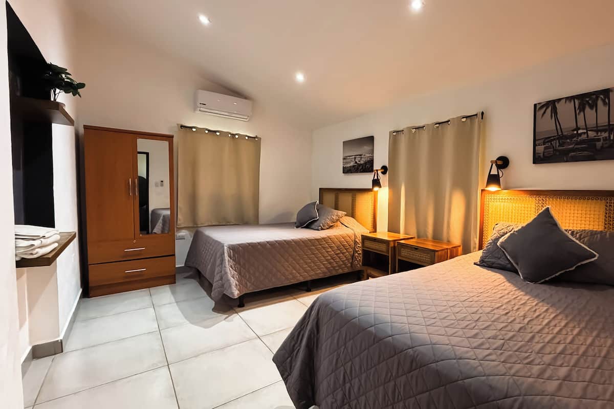 Standard Apartment, 2 Bedrooms, Pool View, Ground Floor | Down comforters, iron/ironing board (on request), cribs (free)