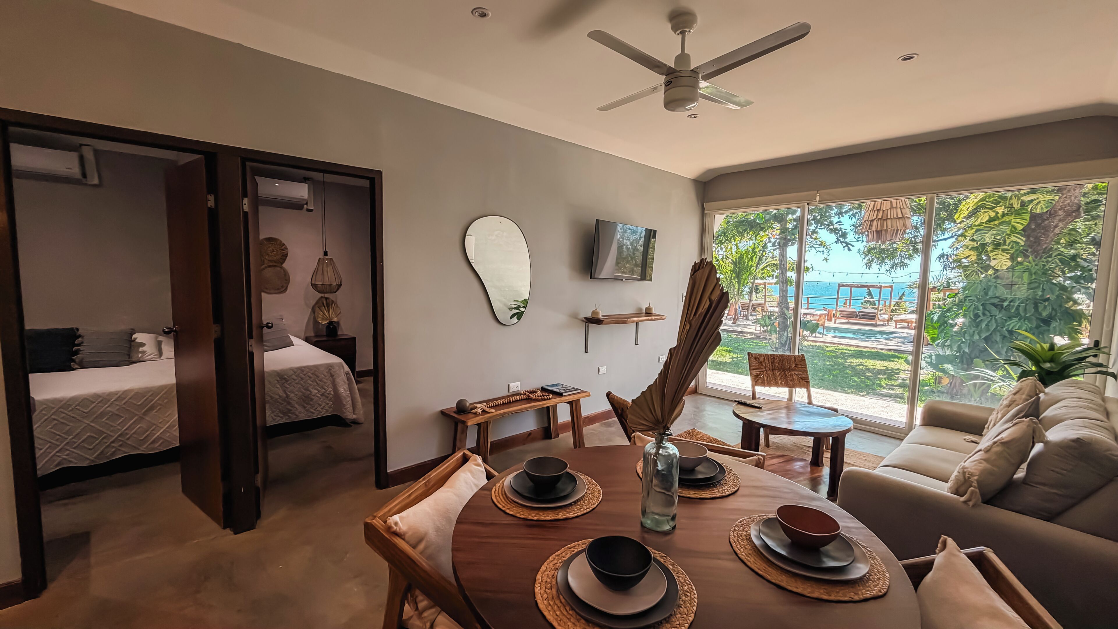 Deluxe Apartment, 2 Bedrooms, Sea View | Living area | 32-inch Smart TV with digital channels