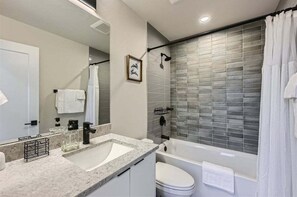 Shower, hair dryer, towels - Perch - Wallingford Comfort: Cozy & Bright 2BR | Parking | Remote Work (Seattle)