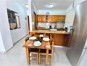 Fridge, microwave, coffee/tea maker, electric kettle