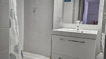 Hair dryer, towels, toilet paper