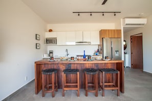 Fridge, microwave, dishwasher, coffee/tea maker