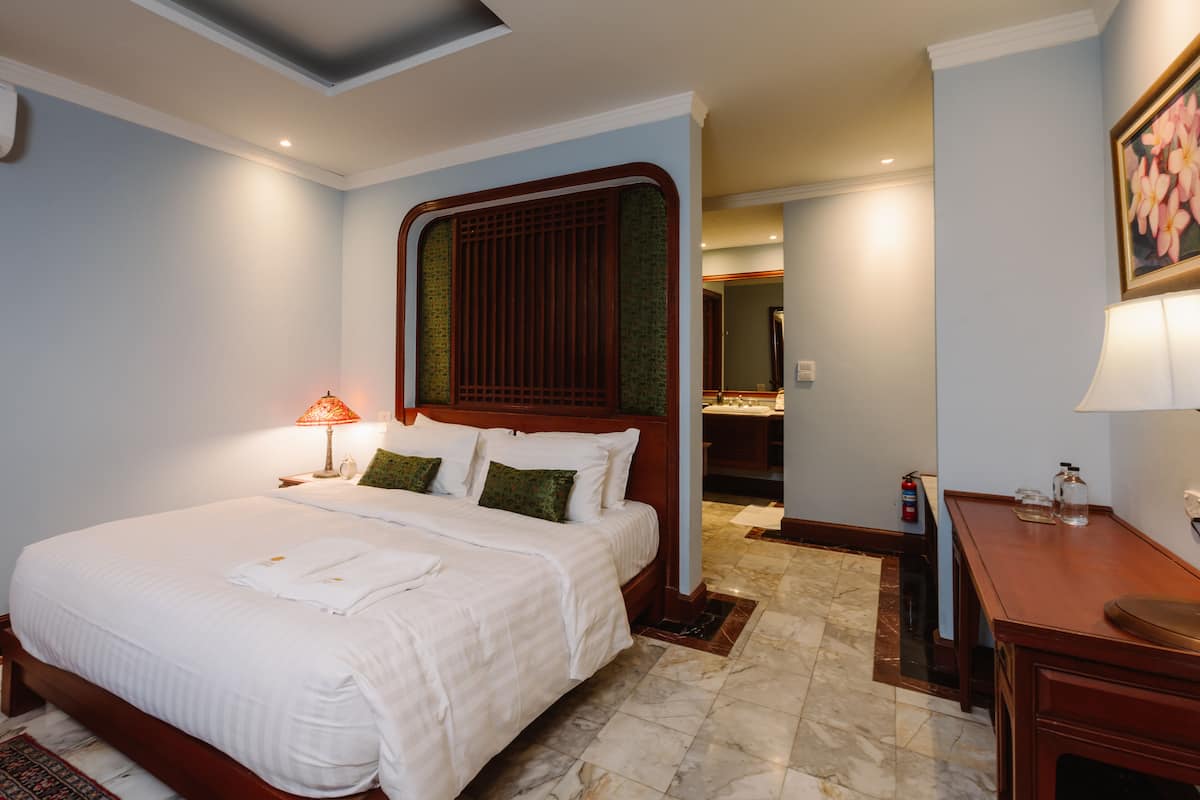 Superior Balcony Room | Minibar (free items), in-room safe, desk, laptop workspace