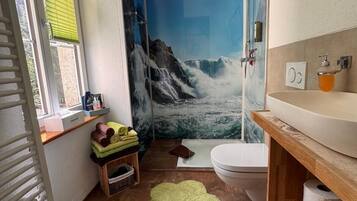 Shower, free toiletries, hair dryer, slippers