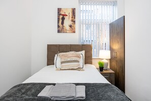 Casa | 4 habitaciones, tabla de planchar con plancha y wifi gratis 