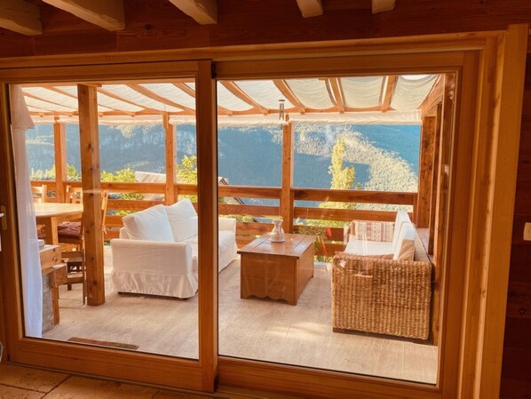 Fireplace, books, stereo, computer monitors