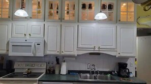 Fridge, microwave, oven, stovetop - Ain't Nothing Special - An unexpected surprise upon entering this unique home.  (Wausau)