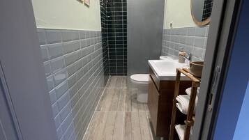 Hair dryer, towels, soap, shampoo