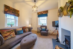 TV, fireplace - Woodfield Lodge -  Rural Cottages with Hot Tub. Dog-friendly (Brookhouse)