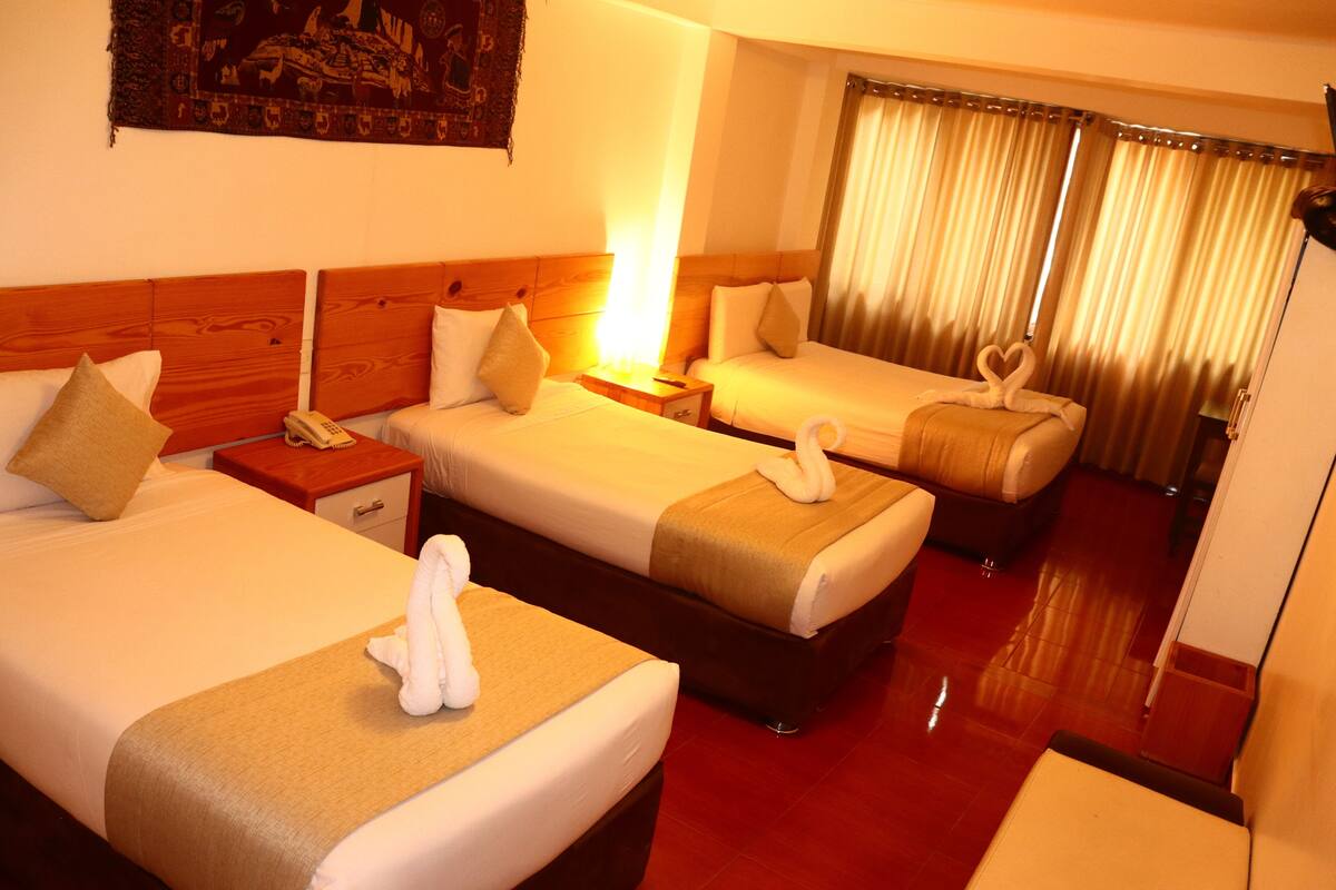 Comfort Quadruple Room | Egyptian cotton sheets, premium bedding, down duvets, in-room safe