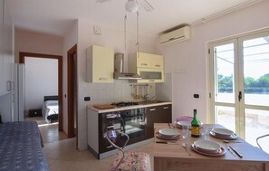 Fridge, stovetop, coffee/tea maker, cookware/dishes/utensils