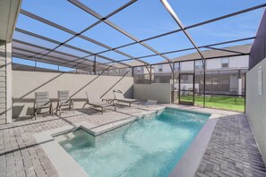 A heated pool - Windsor Island Dream | 5BR, 4.5 Bath Cozy Escape w/ Private Pool and Themed Kids' Rooms Near Disney (Davenport)